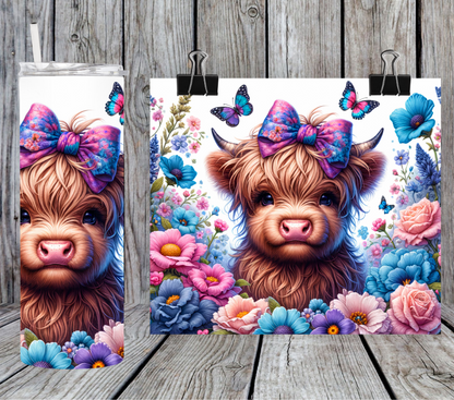 Highland cow with butterflies & flowers